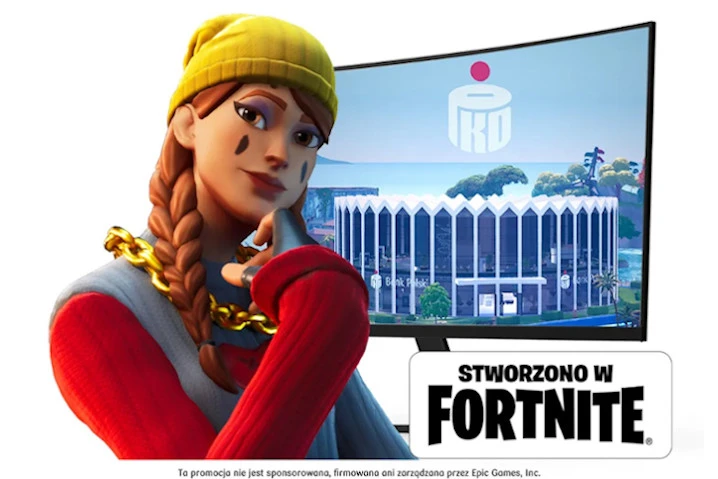 Grafika promocyjna Fortnite z postacią w czerwonym swetrze i żółtej czapce obok ekranu z wirtualnym budynkiem
