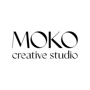 Logo firmy MOKO creative studio w nowoczesnym, stylowym czarno-białym designie